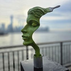 Hudson River Waterfront Walkway - Newport - "Faces" sculptures along the boardwalk ...