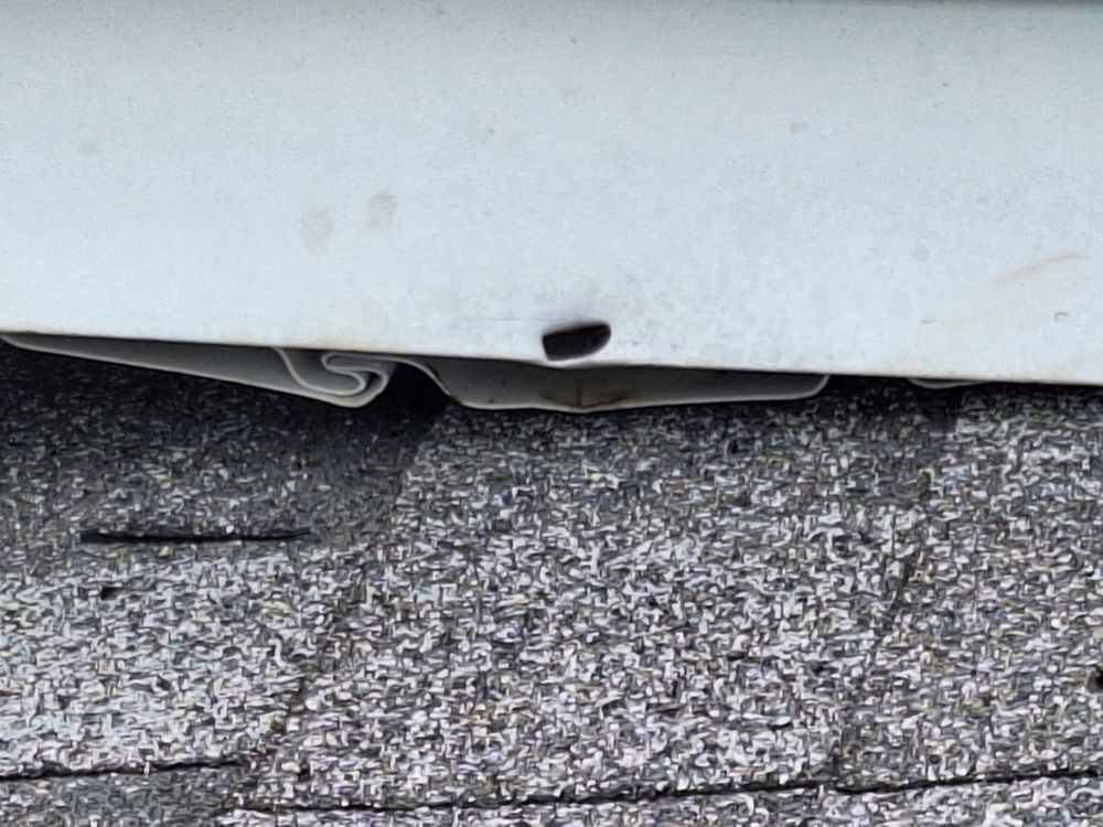 Slide of Storm Pros Roofing and Construction