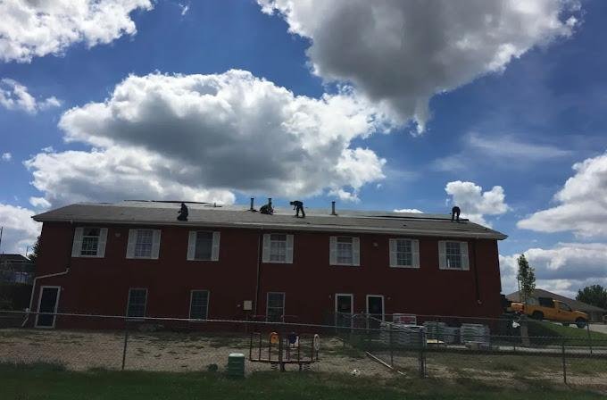 Slide of Bluejay Roofing