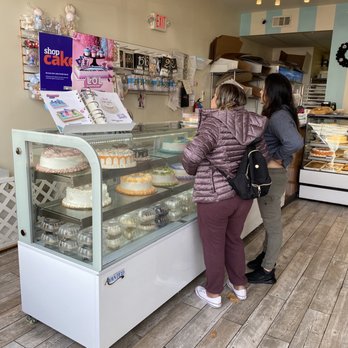 Miguelina Bakery - two people standing in front of a bakery counter - Bakeries Near Me - Pennsauken Township, New Jersey Miguelina Bakery - two people standing in front of a bakery counter - Bakeries Near Me - Pennsauken Township, New Jersey