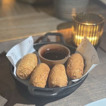 Alma Cocina Latina - TEQUEÑOS (V) the most popular Venezuelan appetizer, white cheese wrapped in pastry dough, guayaba - Venezuelan Near Me - Baltimore, Maryland