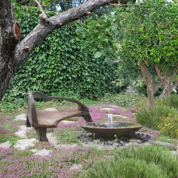GLD Landscape Design - a bench in a garden - Landscaping Near Me