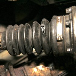 AAA - Crofton - Boot that was damaged by AAA mechanic when using a torch to remove rusted bolts on my starter.