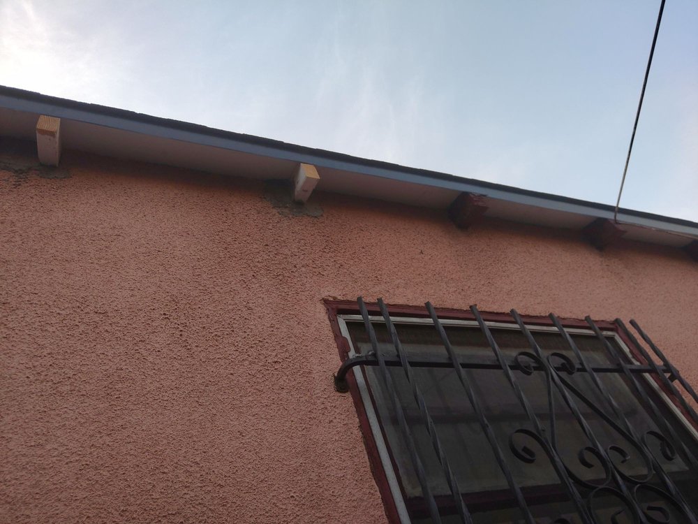 Slide of Immaculate Roofing