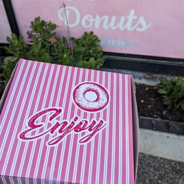 Outside the shop with my half dozen of donuts