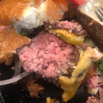 J. Alexander's Restaurant - .The burger in this photo we asked for to be  well done and it came like this . - New American Near Me - Nashville, Tennessee