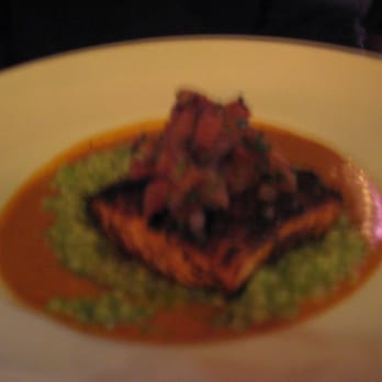 Zocalo - Grilled Salmon w/ green chili & goat cheese couscous, smoked pico, cascabel cream - New American Near Me - Charlottesville, Virginia Zocalo - Grilled Salmon w/ green chili & goat cheese couscous, smoked pico, cascabel cream - New American Near Me - Charlottesville, Virginia
