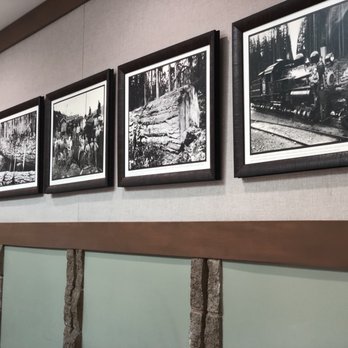 Crenshaw Lumber - a wall of framed photographs - General Contractors Near Me - Gardena, California