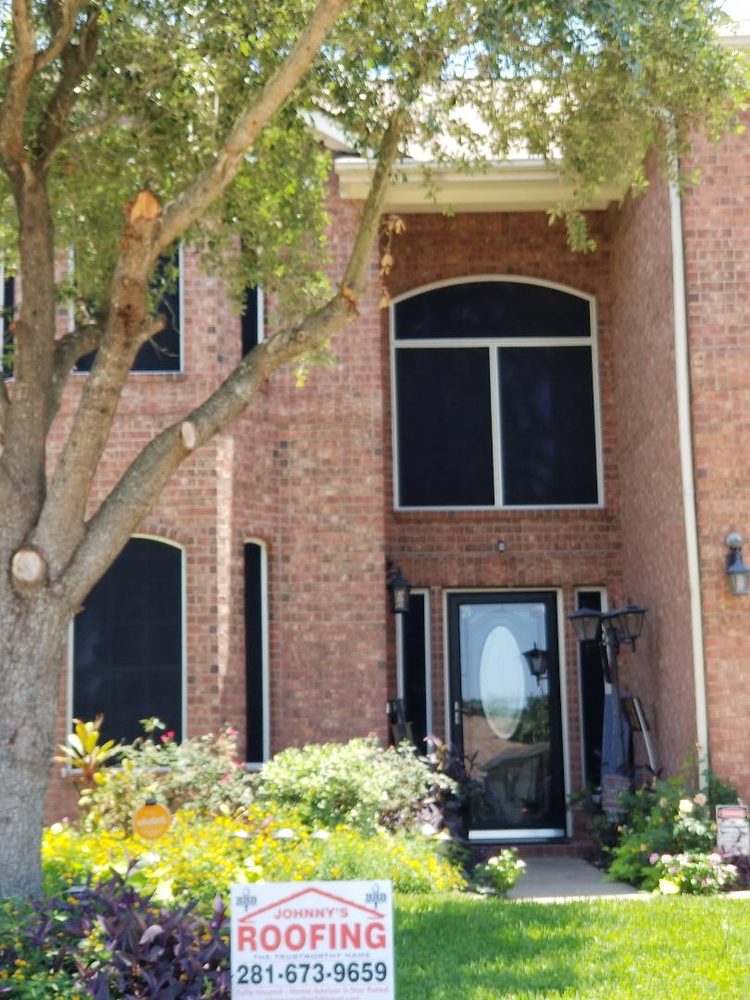 Slide of Johnny's Roofing and storm restoration