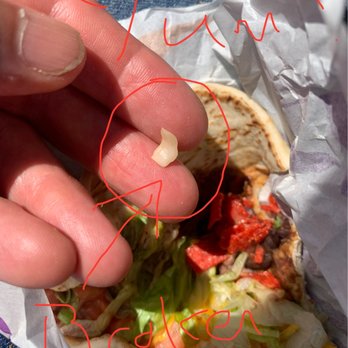 Taco Bell - Broken piece of hard plastic, not bone/beef - Fast Food Near Me - Albany, New York
