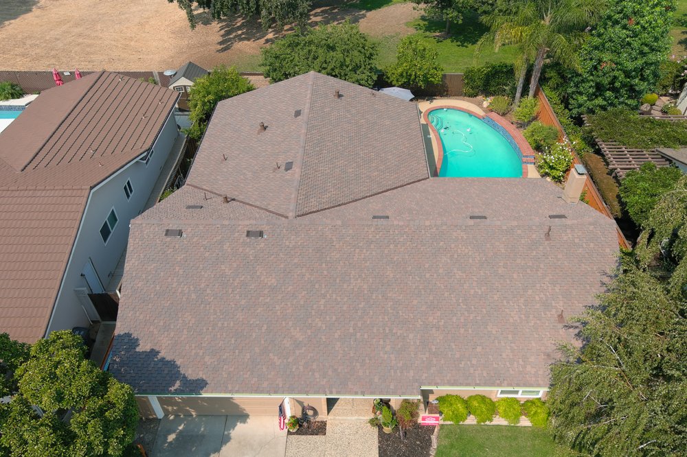 Slide of Sherman Roofing