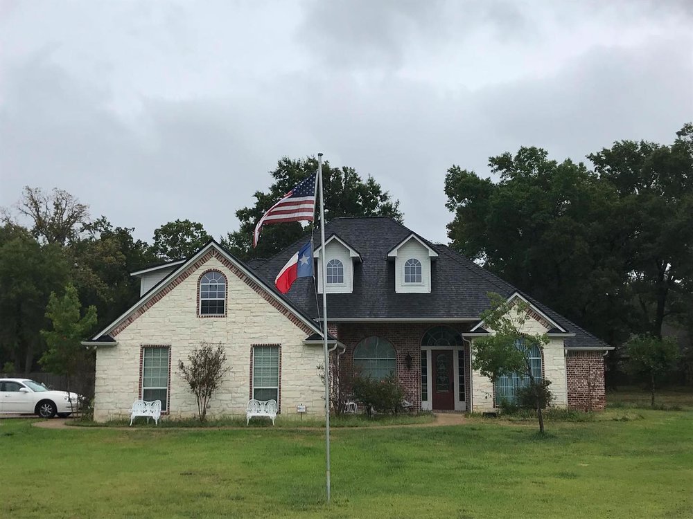 Slide of Spartan Exteriors