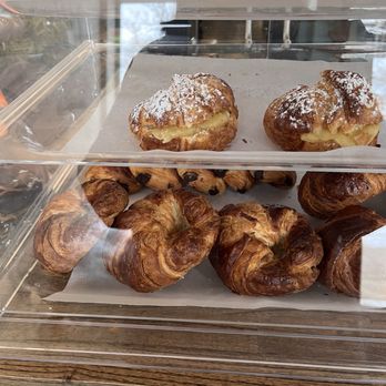 Le Marché - Croissants - Top, almond. Bottom plain and pan au chocolate. - French Near Me - Cleveland, Ohio Le Marché - Croissants - Top, almond. Bottom plain and pan au chocolate. - French Near Me - Cleveland, Ohio