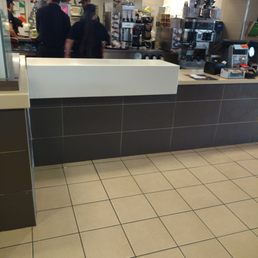 the counter and counter area of a fast food restaurant