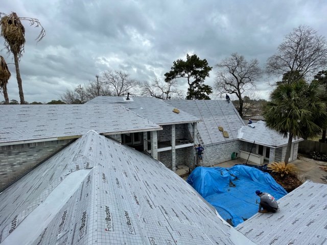 Slide of Lone Star Roofing