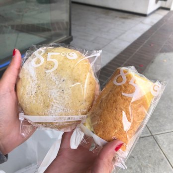 85°C Bakery Cafe-Glendale - Left is milk tea bun and right is coconut cream roll - Bakeries Near Me - Glendale, California 85°C Bakery Cafe-Glendale - Left is milk tea bun and right is coconut cream roll - Bakeries Near Me - Glendale, California