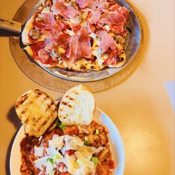 Mama D's du Lac - Meat lover pizza, lasagna with fresh garlic bread.