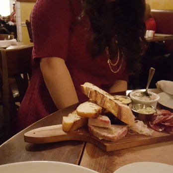Bistro Vendôme - Charcuterie plate with a lot of bread. - French Near Me - Denver, Colorado Bistro Vendôme - Charcuterie plate with a lot of bread. - French Near Me - Denver, Colorado