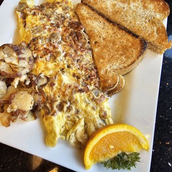 Keke's Breakfast Cafe - 3 meat Omelet with potatoes and toast - Breakfast & Brunch Near Me - Saint Johns, Florida Keke's Breakfast Cafe - 3 meat Omelet with potatoes and toast - Breakfast & Brunch Near Me - Saint Johns, Florida