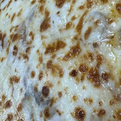 Papa Johns Pizza - Fuzz to left and hair