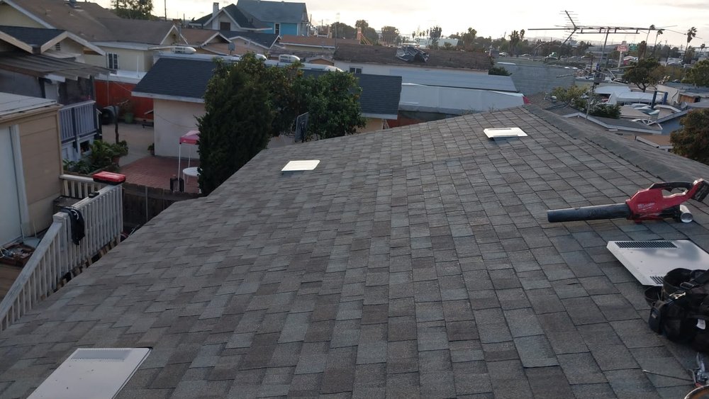 Slide of Tello's Roofing