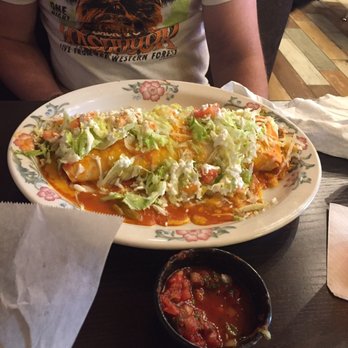 Azteca D' Oro Mexican Restaurant Winter Haven - Macho Burrito: chicken, bean, rice, burrito sauce, cheese, lettuce, tomato and Mexican Crema sauce - Mexican Near Me - Winter Haven, Florida