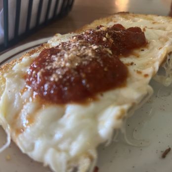 Mama Alvino's Pizzeria - Close up of the juiciest garlic cheese bread around - Pizza Near Me - Aurora, Colorado Mama Alvino's Pizzeria - Close up of the juiciest garlic cheese bread around - Pizza Near Me - Aurora, Colorado