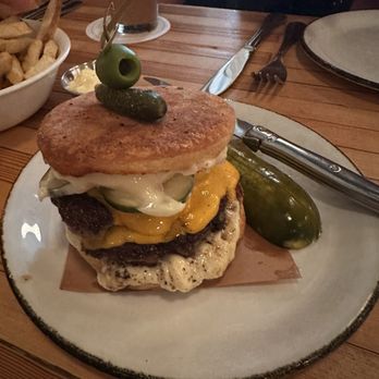Nancy's Hustle - Burger on English muffin - New American Near Me - Houston, Texas Nancy's Hustle - Burger on English muffin - New American Near Me - Houston, Texas
