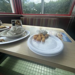 Tater tots taste like they were fried in old grease.