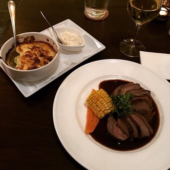 Restaurang Axela - Lamb w/Roasted Garlic Butter, Red Wine Sauce and Potatoes Au Gratin - Brasseries Near Me - Stockholm, Alberta Restaurang Axela - Lamb w/Roasted Garlic Butter, Red Wine Sauce and Potatoes Au Gratin - Brasseries Near Me - Stockholm, Alberta