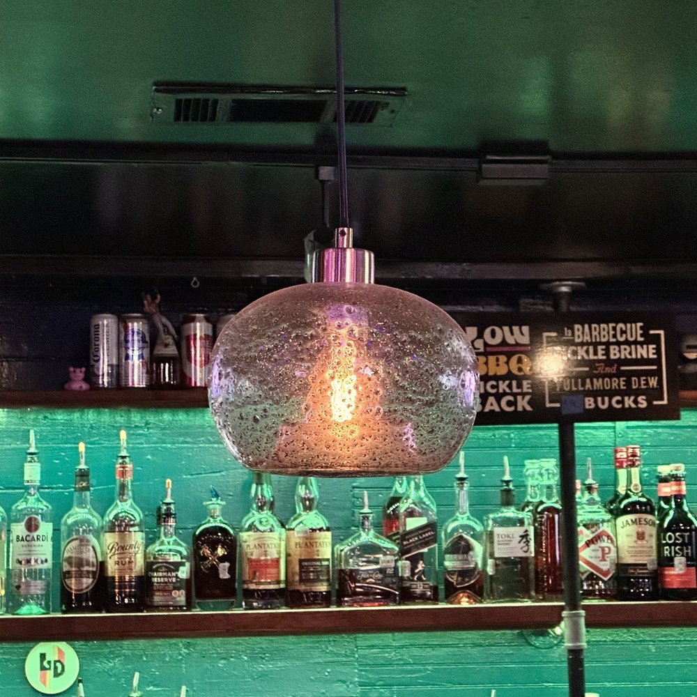 Low Down Lounge - a bar filled with bottles of alcohol - Lounges Near Me - Austin, Texas