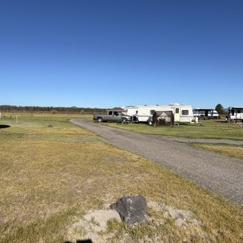 Cascade Meadows RV Resort - The other length of space to walk to the end of the row. - RV Parks Near Me - La Pine, Oregon