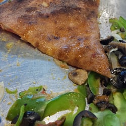 Very soggy backside from oil that separates from the cheese on the pizza