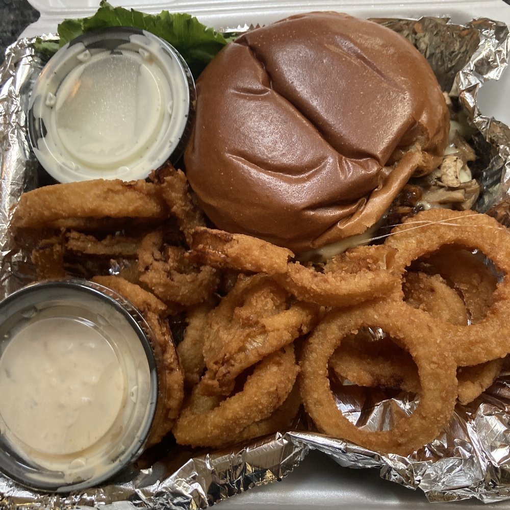 Monica's - Black bean burger with mushrooms and havarti cheese and a side of onion rings - Italian Near Me - Coralville, Iowa Monica's - Black bean burger with mushrooms and havarti cheese and a side of onion rings - Italian Near Me - Coralville, Iowa