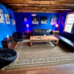 Strange Brew Pub - Cool nook with couch and bean bag seating plus a faux fireplace
