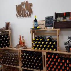 Twisted Vine Winery - A lot of variety, stacked and displayed neatly.