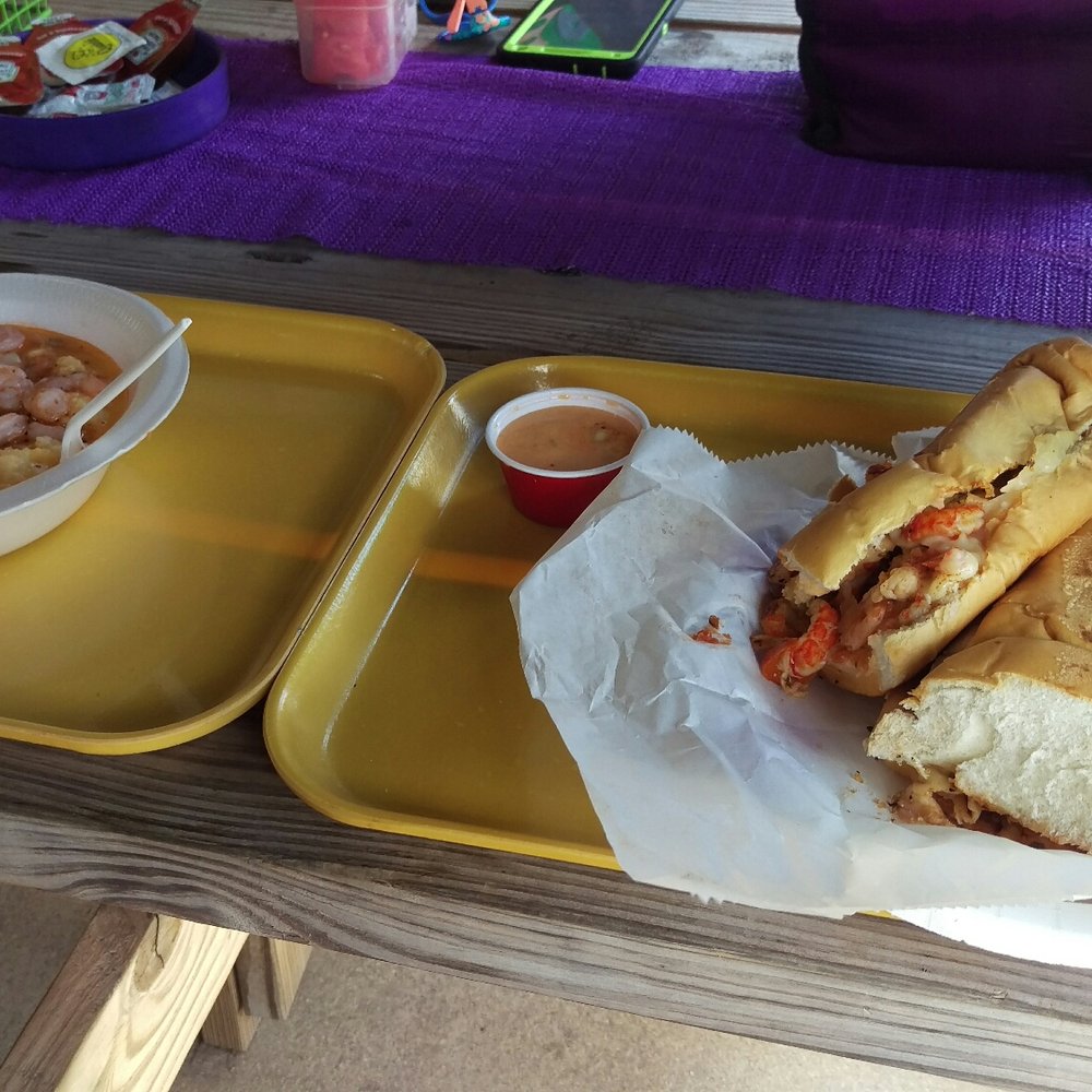 Lunch is served. Crawfish bread and shrimp and grits. Lunch is served. Crawfish bread and shrimp and grits.