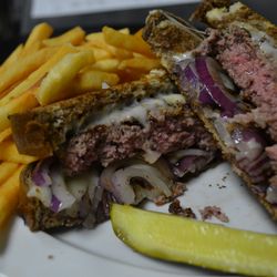 Crafty Bastards Restaurant & Pub - Grilled Reuben – Corned Beef, Sauerkraut, Swiss Cheese, 1000 Island on Grilled Marble Rye Bread