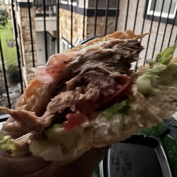 Carnivorous - A portion of my sandwich... - Cuban Near Me - Georgetown, Texas