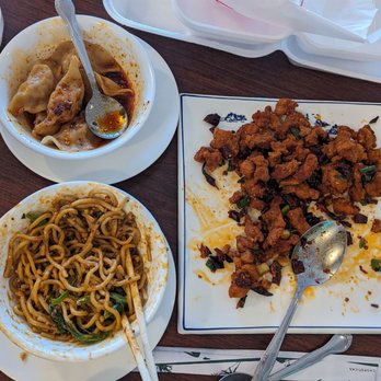 Little Sichuan Cuisine - Chengdu dumplings (top left), Sichuan Dan Dan noodles with minced pork (bottom left), Hot and spicy chicken (square plate). - Szechuan Near Me - Plano, Texas Little Sichuan Cuisine - Chengdu dumplings (top left), Sichuan Dan Dan noodles with minced pork (bottom left), Hot and spicy chicken (square plate). - Szechuan Near Me - Plano, Texas