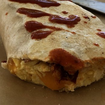 Juniper Market - Breakfast burrito with hot sauce - Coffee & Tea Near Me - Saint Augustine, Florida Juniper Market - Breakfast burrito with hot sauce - Coffee & Tea Near Me - Saint Augustine, Florida