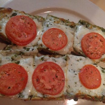 Florencia Pizza Bistro - Pesto bread with tomatoes. - Pizza Near Me - Ahwatukee, Arizona Florencia Pizza Bistro - Pesto bread with tomatoes. - Pizza Near Me - Ahwatukee, Arizona