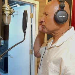 Blank Reel Studios - Lead singer of band preparing to record vocals.