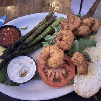 The Bone and Barrel - Shrimp Po'Boy with asparagus side. - New American Near Me - Fairhope, Alabama The Bone and Barrel - Shrimp Po'Boy with asparagus side. - New American Near Me - Fairhope, Alabama