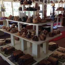 Art of the Burl Redwood Gallery - Large showroom featuring burl wood functional art made on-site, metal sculptures, fountains, jewelry, baskets, and fiber art.