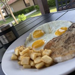 Isidora's Family Kitchen - Coffee, pork chop and eggs