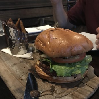 Foxhole Culinary Tavern - Kobe Burger on a GF bun - New American Near Me - Austin, Texas Foxhole Culinary Tavern - Kobe Burger on a GF bun - New American Near Me - Austin, Texas