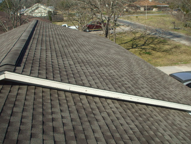 Slide of Ruddy's Roofing