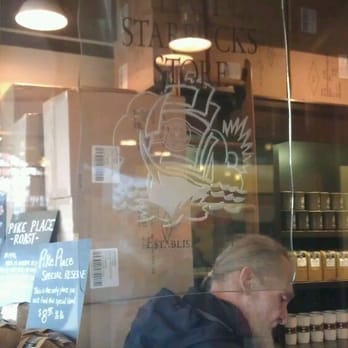 Starbucks - Bum by the sign - Coffee & Tea Near Me - Seattle, Washington