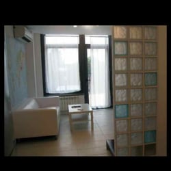 Nomad Plaza - Salon que lleva al jardin, terraza y Lounge.